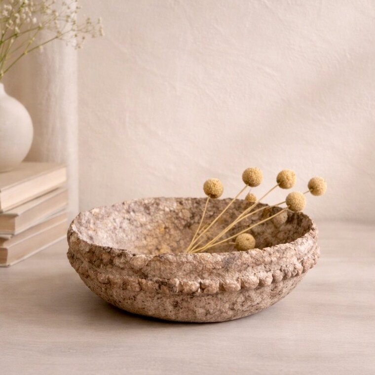 Handcrafted textured bowl with dried flowers